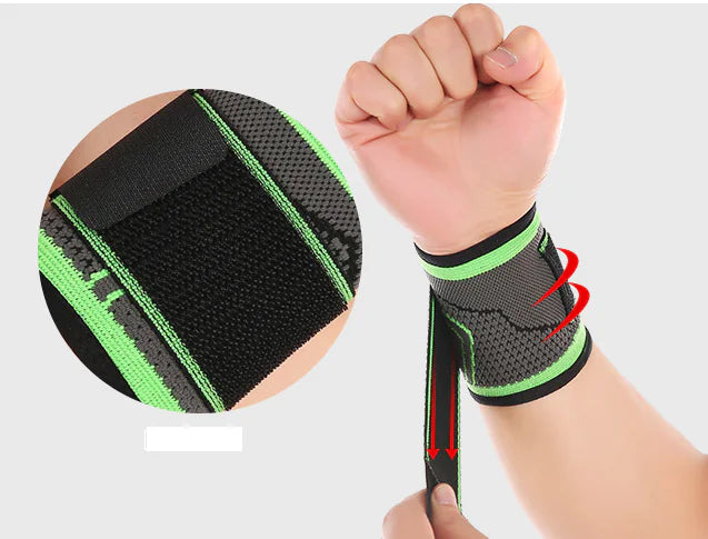 Black wrist support brace with green accents on a white background, from ghg global powerhouse.