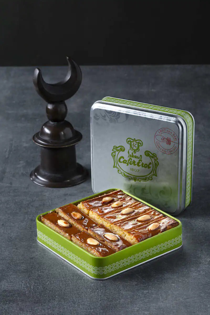 sekerci cafer erol basbousa with almonds in green tin box from ghg wellness shop